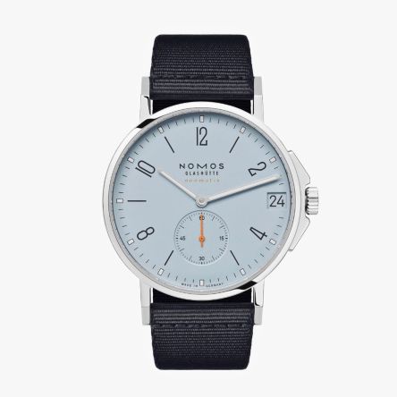 NOMOS Ahoi Neomatik 38 Date Sky Ref. 516 with sky-blue dial and black textile strap.