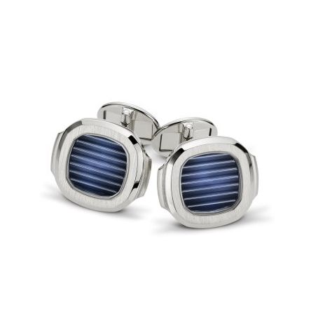 Patek Philippe Ref. 205.9057G-014 cufflinks crafted from 18-carat white gold, featuring a striking blue center with a black-gradient rim. 