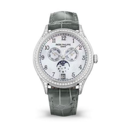 The Patek Philippe Complications Ref. 4948G-010 in white gold features a white Balinese mother-of-pearl dial and a luxurious white alligator leather strap, embodying elegance and sophistication.
