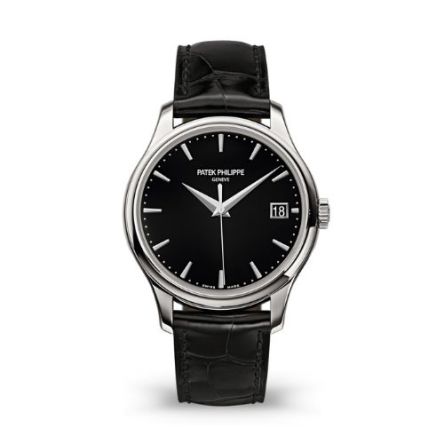 The Patek Philippe Calatrava Ref. 5227G-010 in white gold, featuring a black lacquered dial with gold applied hour markers, paired with a shiny black alligator strap.