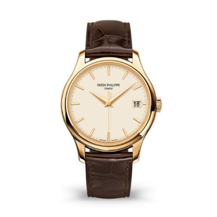 The Patek Philippe Calatrava Ref. 5227J-001 in yellow gold features an ivory lacquered dial with gold-applied hour markers, paired with a chocolate brown alligator strap for timeless sophistication.