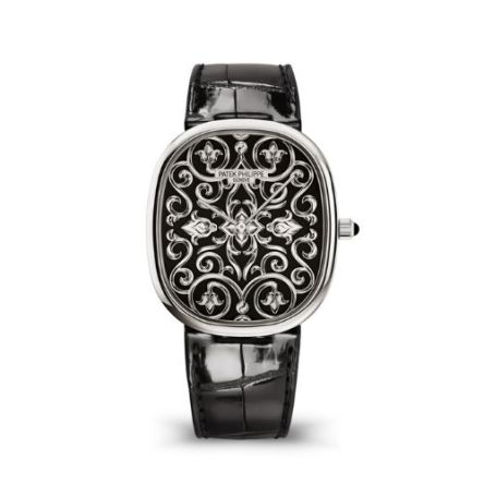 Patek Philippe 5738/51G-001 in white gold with black sunburst dial and alligator strap.