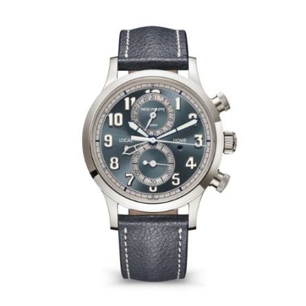 The Patek Philippe Complications Ref. 5924G-001 in white gold showcases a striking sunburst blue-gray dial paired with a grained navy blue calfskin strap.
