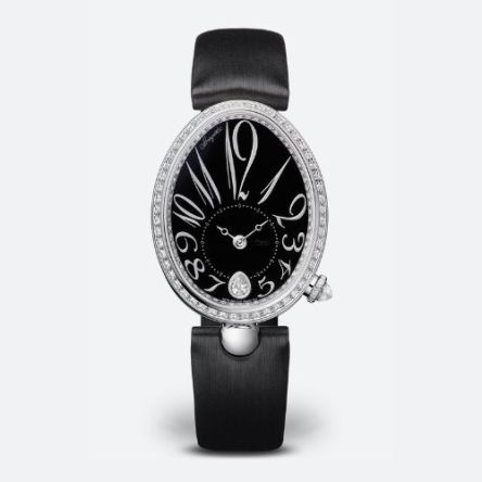 The mother-of-pearl dial of the Reine de Naples Ref. 8918BB/2N/764/D00D, featuring Breguet Arabic numerals, blue steel hands.