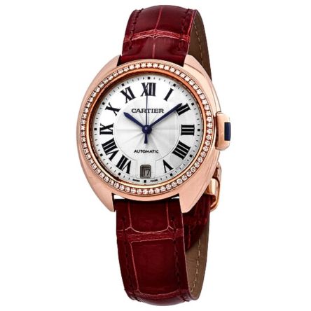Cartier Clé de Cartier WJCL0013 with 18K rose gold round case, Roman numeral dial, and elegant leather strap.