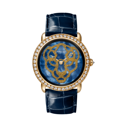 Révélation d'une Panthère Ref. HPI01354 with yellow gold case, diamond-set bezel, and mother-of-pearl dial.