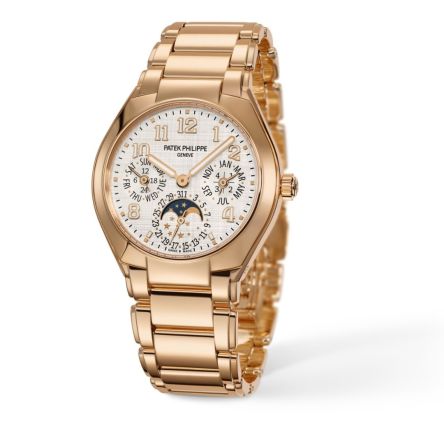 The Patek Philippe Twenty~4 Ref. 7340/1R-001 features a polished rose gold case, a silvery dial with a shantung silk-like finish, and an integrated rose gold bracelet with a fold-over clasp.

